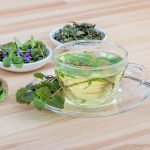 Wooden plate of herbal tea, best herbs to grow for tea